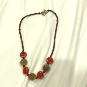 Black bead and ceramic necklace.